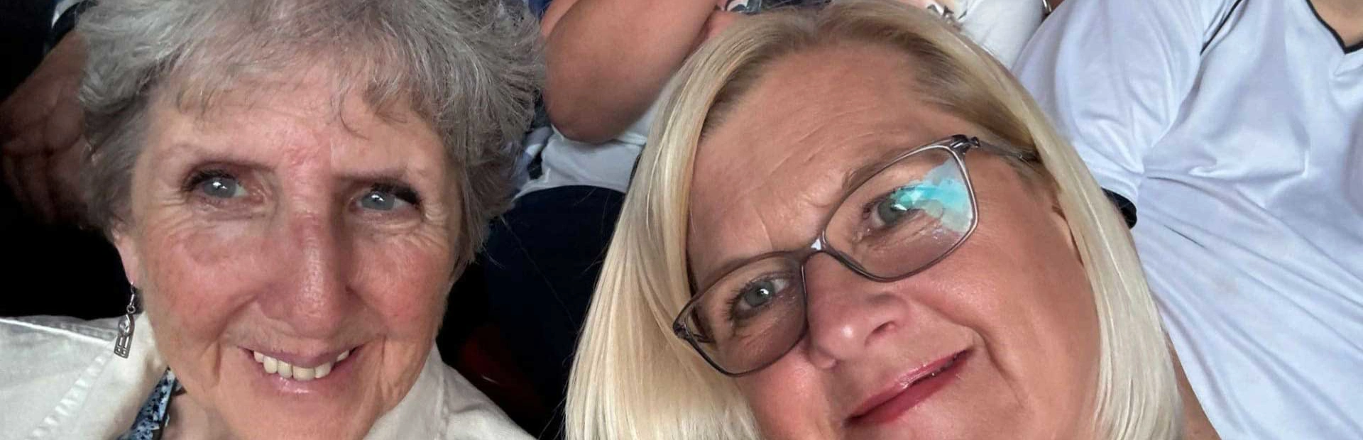 A close up picture showing Sandra and Gemma sitting next to each other, smiling for a selfie A close up picture showing Sandra and Gemma sitting next to each other, smiling for a selfie